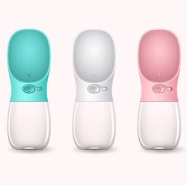 Portable One-Touch Pet Water Bottle in pink showing water tray and one-touch button, solo front view on light background