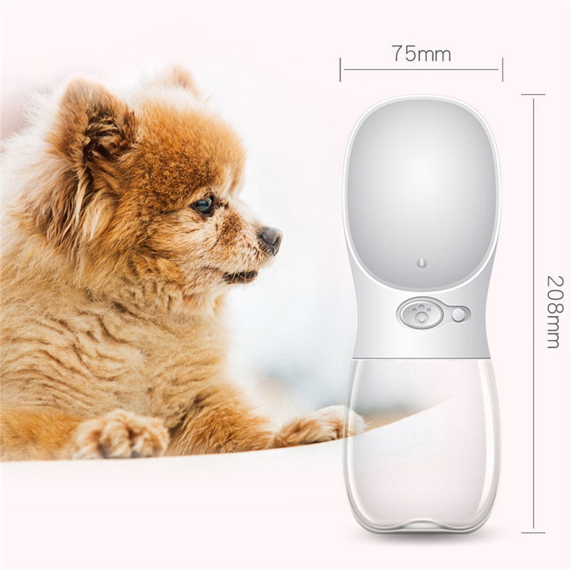 Pomeranian dog sitting next to white Portable One-Touch Pet Water Bottle with 75mm width dimension label