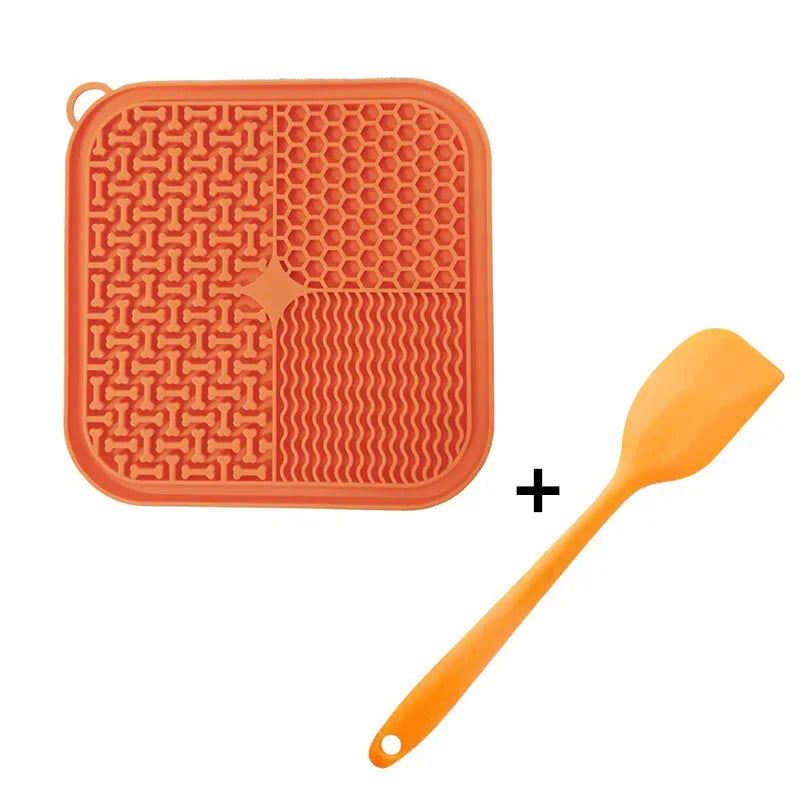 Orange Licking Mat Slow Feeder + Spatula - Food grade silicone slow feeder licking mat with bonus spatula for easy feeding