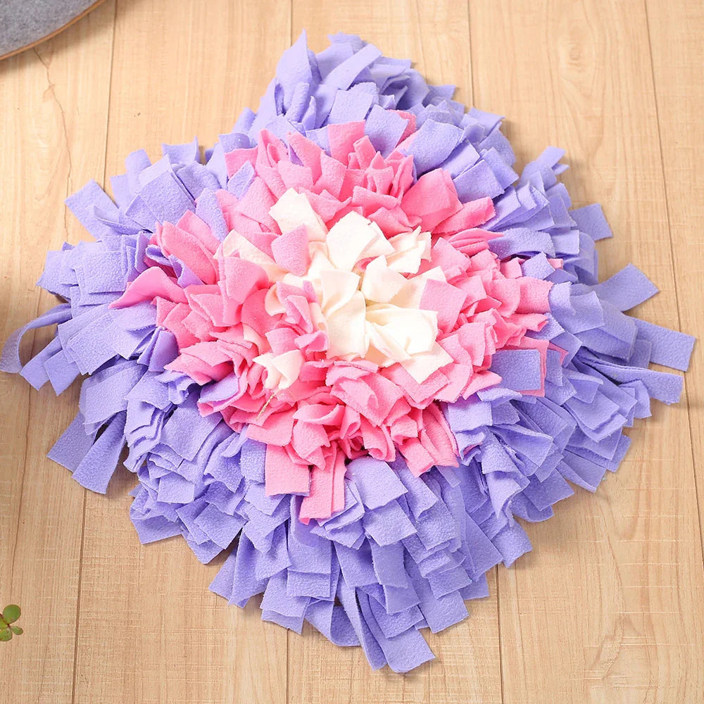 Dog snuffle mat in purple and pink colors for anxiety relief and mental stimulation